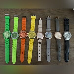 A lot of 13 watches